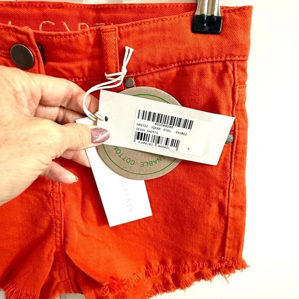 NWT Stella McCartney Kids denim shorts,in orange Size 6